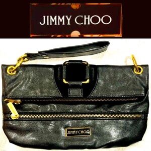 JIMMY CHOO Black leather Marin Clutch Wristlet Flap-over size 11”Hx6.25”W used